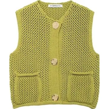Dámská vesta Dámská pletená vesta s výstřihem do V a kapsičkami Jednobarevná stylová vesta se zapínáním na knoflíky Pohodlný polyesterový svetr různých barev zelená S