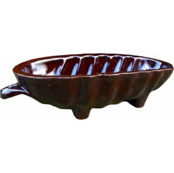 Formička Formička-zbytkovník-makovec.Malá formička na zbytky těsta.Hnědá glazura,asi 12cm.Tvar zákusku,které děti milují.