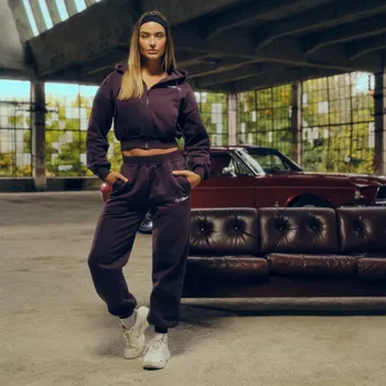 GymBeam Dámské tepláky GymBabe Eclipse S fialová