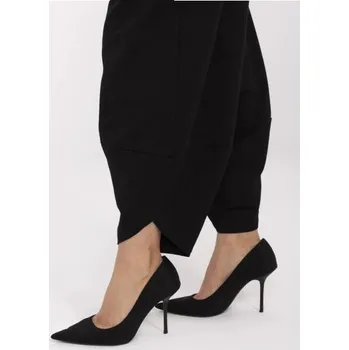 Černé tepláky s rozparky