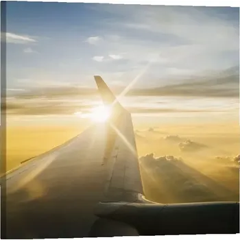 Obraz Sablio Obraz Křídlo letadla nad mraky - 50x50 cm