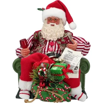 Vánoční dekorace NONAME Mikuláš s dárky sedící v křesle 20 cm 524557