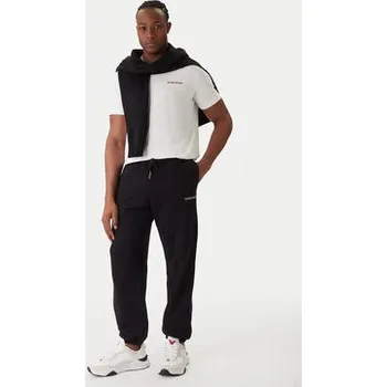 Dámské oblečení Guess Jeans Teplákové kalhoty M6RB70 KCPR1 Černá Regular Fit XS