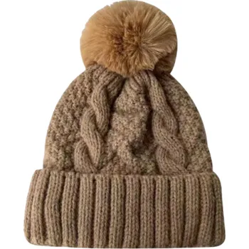 Pokrývka hlavy Dámská zimní pletená čepice Twist s kožešinovou bambulí Polyesterová teplá čepice 55–60 cm Jednobarevná lyžařská čepice s chlupatou bambulí hnědá