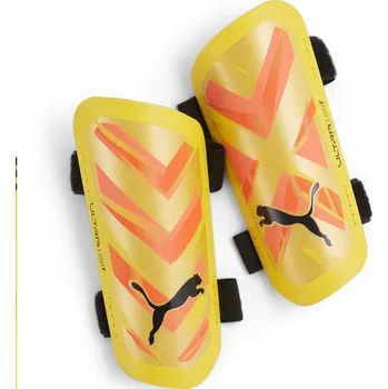 Fotbalový chránič Puma Chrániče holeně Ultra Light Strap 030875-09 (XXS) (XXS, oranžová)