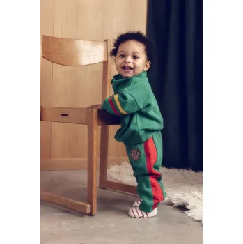 Chlapecké kalhoty Dětské bavlněné tepláky Mini Rodini E.T. 25830100 zelená 77X, vel. 128-134