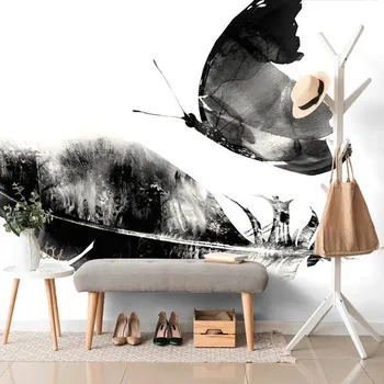 Tapeta Dovido Tapeta pírko s motýlem v černobílém