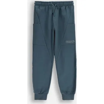 Chlapecké kalhoty Tepláky Coccodrillo šedá barva, YETI BOY JUNIOR ZC5120201YBJ 09X, vel. 140