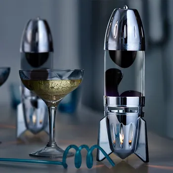 Lampa pro světelnou terapii Mathmos Fireflow R1 Silver, originální lávová lampa stříbrná s čirou tekutinou a černou lávou, pro čajovou svíčku, výška 24cm