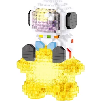 ostatní stavebnice Stavebnice astronaut 9,8 x 7,0 x 4,2 cm Sedící kosmonaut na zlaté hvězdě 387 dílků Průhledné žluté mini bloky Detailní vesmírná dekorace