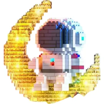 ostatní stavebnice Stavebnice astronaut 9,3 x 9,2 x 4,5 cm Astronaut na zlatém srpku měsíce Detailní mini bloky Průhledné žluté dílky Vesmírná dekorace