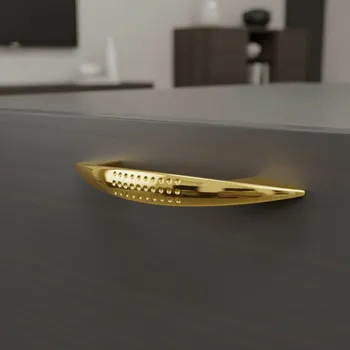 Nábytkové kování Interex Úchytka TYLLAU / Zlatá 96 mm