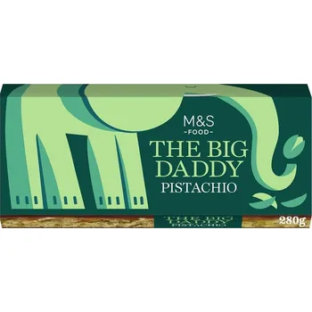 Čokoláda Marks & Spencer Čokoládová tyčinka s pistáciovou náplní, karamelem a kousky pistácií