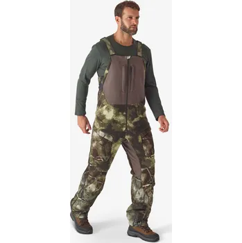 Pánské kalhoty SOLOGNAC Kalhoty s laclem hřejivé nehlučné 900 maskovací vzor Treemetic M