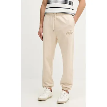 Bavlněné tepláky Tommy Hilfiger MW0MW42537 béžová 08X, vel. M
