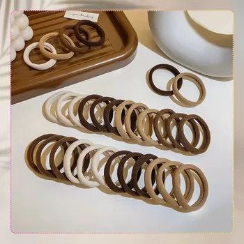 Camerazar Sada 50 kusů jednoduchých hnědých a béžových elastických gumových gumiček na vlasy