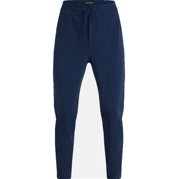 Dámské kalhoty KALHOTY PEAK PERFORMANCE W ANY JERSEY PANTS BLUE SHADOW