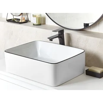 Umyvadlo na desku bílé keramické 49 x 38 cm černý okraj lesklý povrch obdélníkový tvar moderní styl koupelna Beliani
