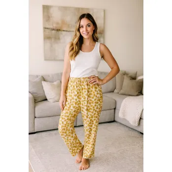 Dámské kalhoty Dámské kalhoty s květinami krémové 56