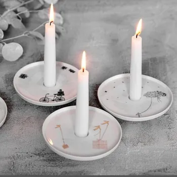 Svícen Porcelánový svícen s motivem kola Raeder