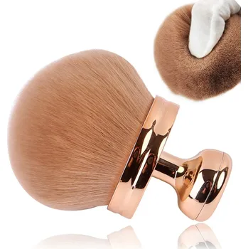 Obraz Duży pędzel do makijażu ciała s měkkým bronzerovým rozjasňovačem PÚ zlatý