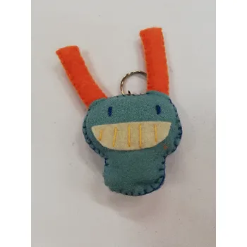 Přívěšek na klíče z plsti - příšera č.1 sv.modrá s oranžovou 9 x 7 cm