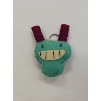 Přívěšek na klíče z plsti - příšera č.1 tyrkys s fialovou 9 x 7 cm