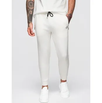 Pánské tepláky s žebrovanými nohavicemi a gumovým potiskem – bílé V2 OM-PASK-0223