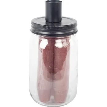 Svícen Skleněný svícen s červenými svíčkami