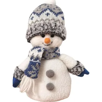 Sněhulák v šedé čepici a s šálou na postavení 19 cm