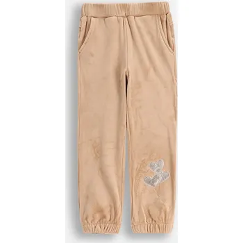 Chlapecké kalhoty Dětské tepláky Coccodrillo béžová barva, s aplikací, WINTER COSY GRIL KIDS ZC5120101WGK 80X, vel. 110