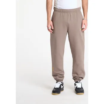 Tepláky Nike x NOCTA Fleece CS Sweatpants Olive Grey/ Yellow Ochre XXL