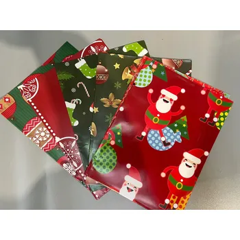 Balící papír Vánoční dárkový balicí papír 70x50 cm, 7 kusů