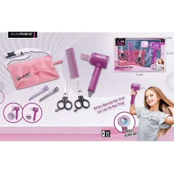 Obraz Kadeřnická sada se fénem na baterie