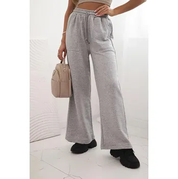 Dámské kalhoty Široké bavlněné teplákové kalhoty s kapsami a vázáním v pase model 7367 šedé
