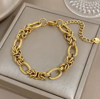 Náramek B-TOP Pozlacený nerezový náramek se spletenými oky