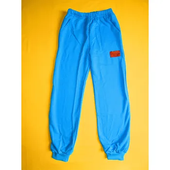 Arex, ČR Tepláky s manžetou jednobarevné s nášivkou 1 Barva: tyrkysově modrá, Velikost: 110