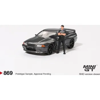 autíčko NISSAN SKYLINE GT-R (R32) NISMO NISMO GUNMETAL WITH TSUGIO MATSUDA 1992 -1:64 - Mini GT