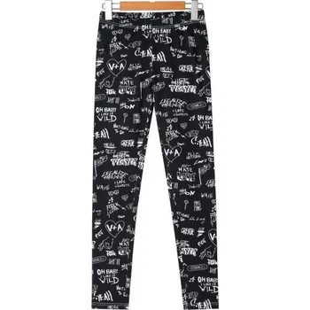 Dívčí legíny Dívčí legíny GLO-STORY s bílými nápisy černé, vel. 158cm