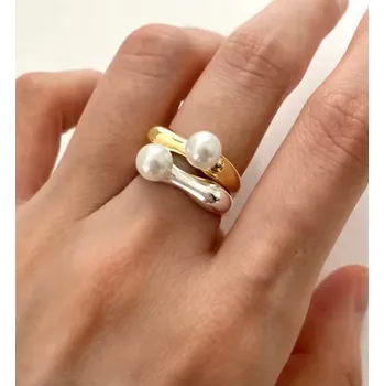 Prsten Prosperk Stříbrný prstýnek s perličkou Barva: Zlatá