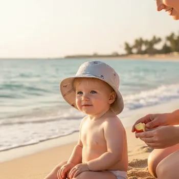 Klobouk LIEWOOD Klobouček Damon - Vehicles/dove blue mix Velikost: 09-12m