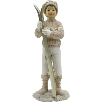 Bytová dekorace Zimní dekorace socha chlapec v růžovém svetru s lyžemi - 9*7*21 cm