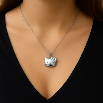 Přívěsek Stříbrný otevírací medailonek Hello Kitty