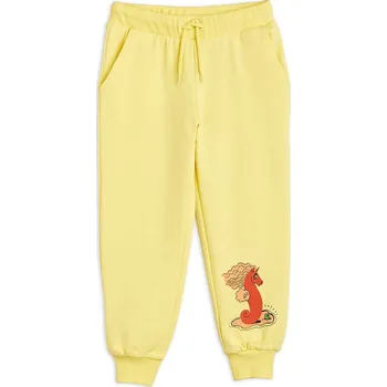 Dětské bavlněné tepláky Mini Rodini 2363012423 žlutá 10X, vel. 56-62