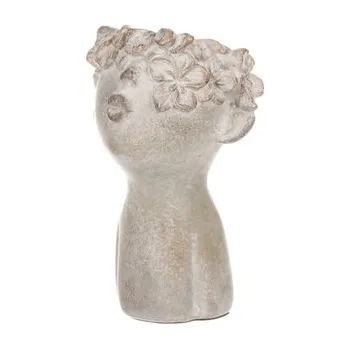 Obal na květináč Obal na květiny betonový, tvar hlavy, barva měděná. (cs)