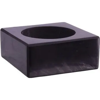 Ochranný a uzemňující svícen z přírodního karelského šungitu, elegantní doplněk pro harmonizaci prostoru.