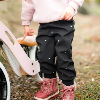 Chlapecké kalhoty Softshellové kalhoty podzim–zima / černé s puntíky Velikost: 104