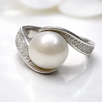 Prsten Stříbrný prsten s perlou a zirkony Francis - 52