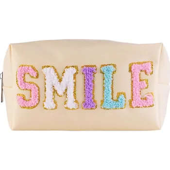 Kosmetická taštička s nášivkou "SMILE"