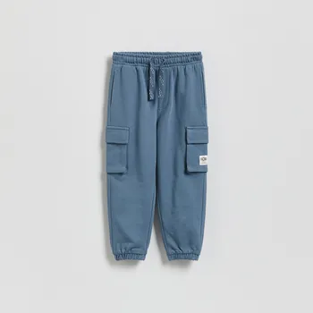 Chlapecké oblečení Reserved - Bavlněné kalhoty jogger - modrá - 480HK-55X - 480HK-55X-92